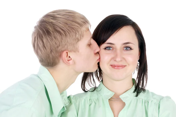 Guy kissing his smiling girlfriend — Stock Photo, Image