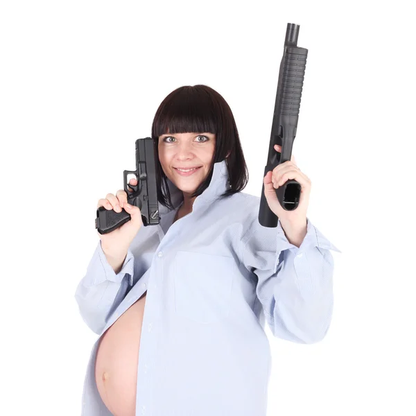 Pregnant woman with pistol — Stock Photo, Image