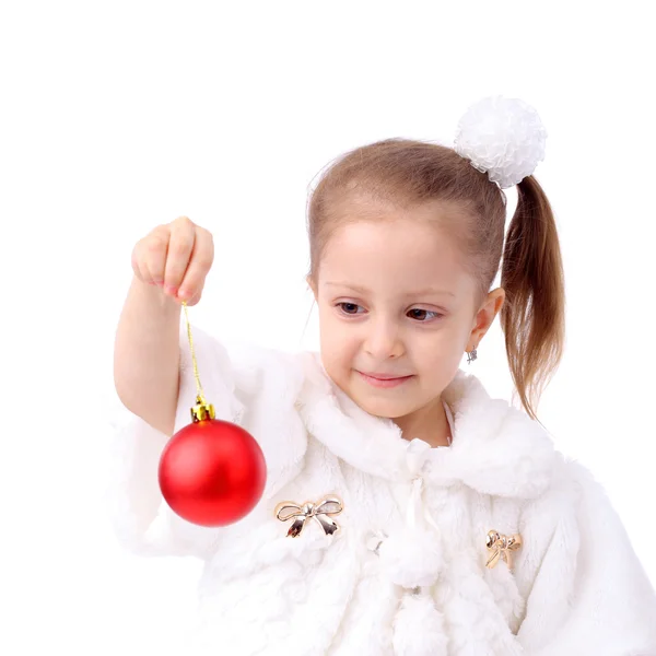 Kleines Mädchen mit Neujahrsbällen — Stockfoto