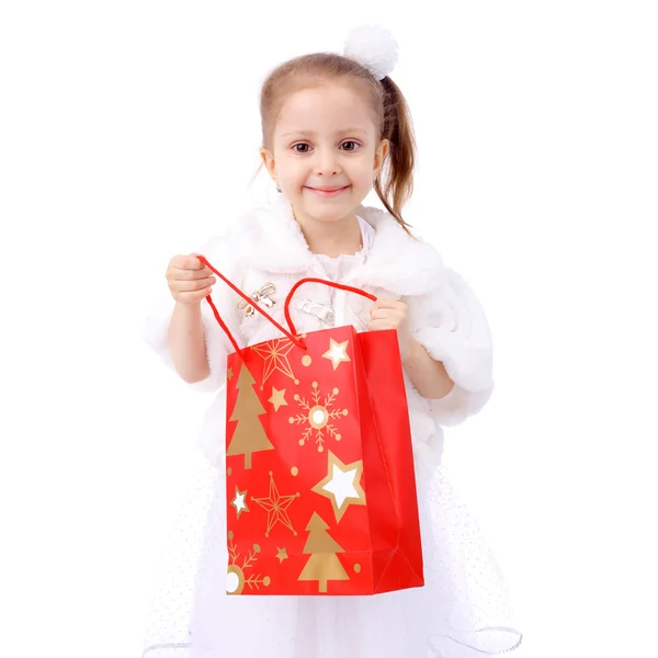 Petite fille avec sac cadeau — Photo