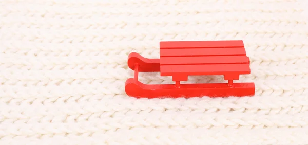 Red wooden sledge christmas souvenir — Stock Photo, Image
