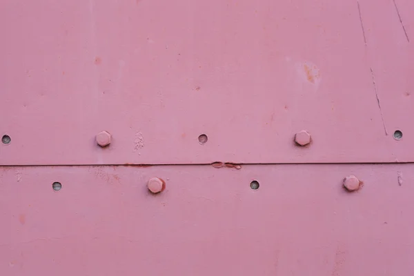 Metalen klinknagels op muur — Stockfoto