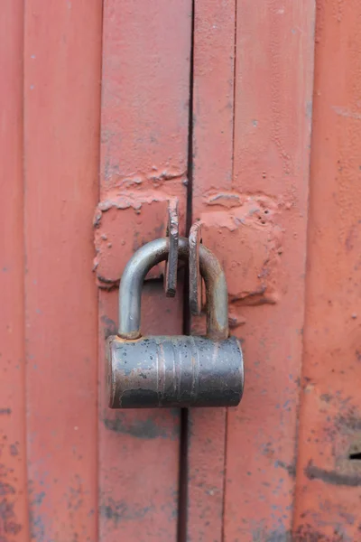 Padlock on garage gate — Stock Photo, Image