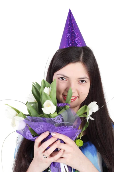 Ung vacker flicka med blommor — Stockfoto