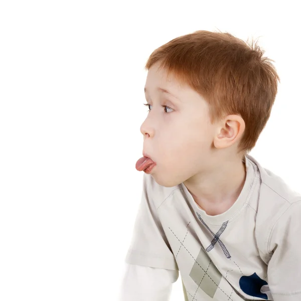 Bambino mostrando lingua — Foto Stock