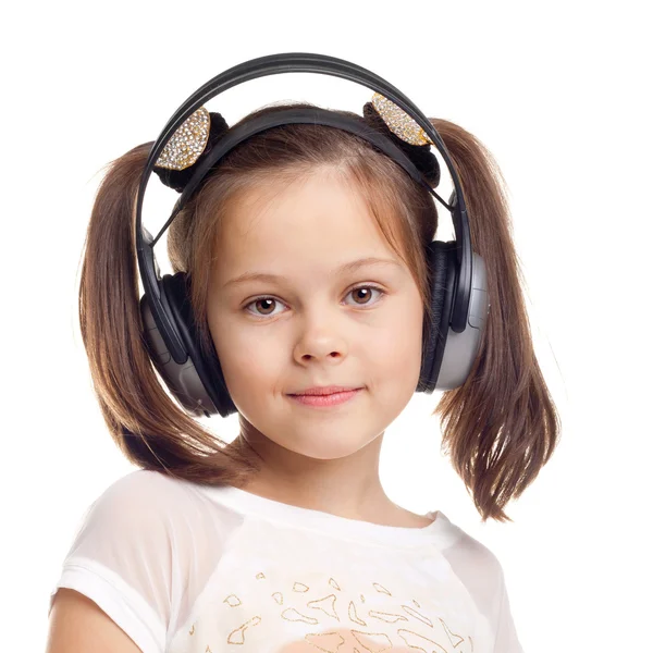 Niña usando auriculares — Foto de Stock