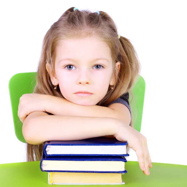 Klein meisje met boeken — Stockfoto