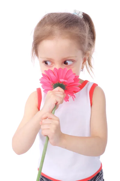Kislány piros virággal — Stock Fotó