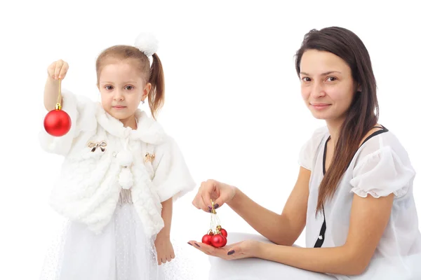 Little girl and mom with decorations — Stock Photo, Image