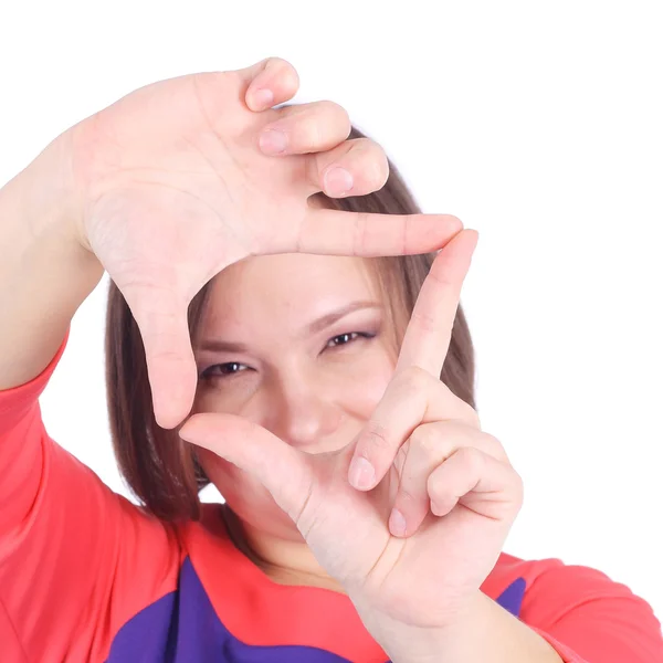 Woman looking through fingers — Stock Photo, Image