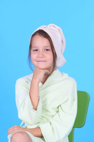 Little smiling girl in bath robe — Stock Photo, Image