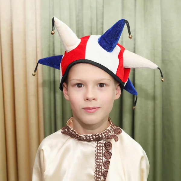 Little boy playing role of skomorokh — Stock Photo, Image