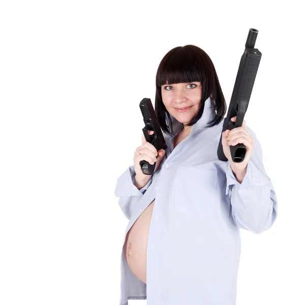 Pregnant woman with pistols — Stock Photo, Image