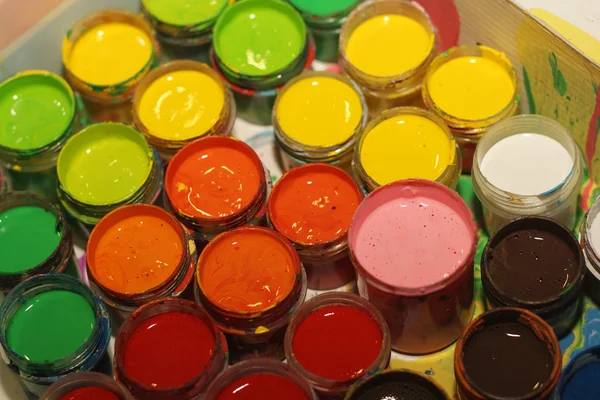 Tubes of bright acrylic paints — Stock Photo, Image
