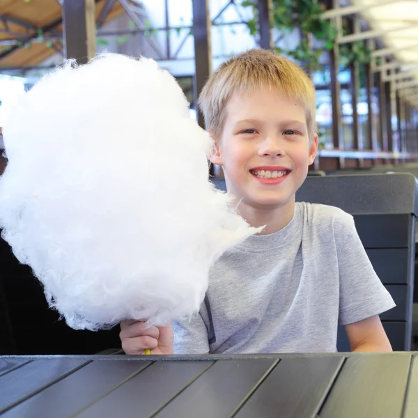 Little boy with cotton candy — Stock Photo, Image