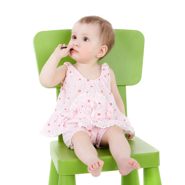 Little baby sitting on chair — Stock Photo, Image