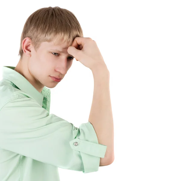 Schöner junger Mann denkt — Stockfoto