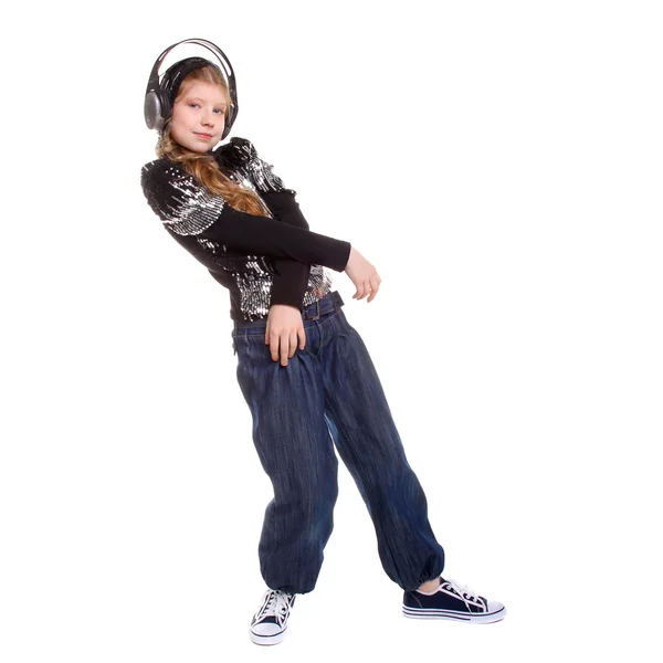 Menina adolescente bonita em fones de ouvido — Fotografia de Stock