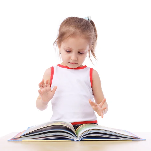 Little girl reading book Stock Photo