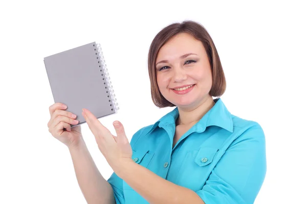 Pretty young woman with writing book — Stock Photo, Image