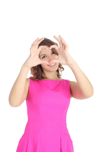 Pretty girl making heart symbol — Stock Photo, Image