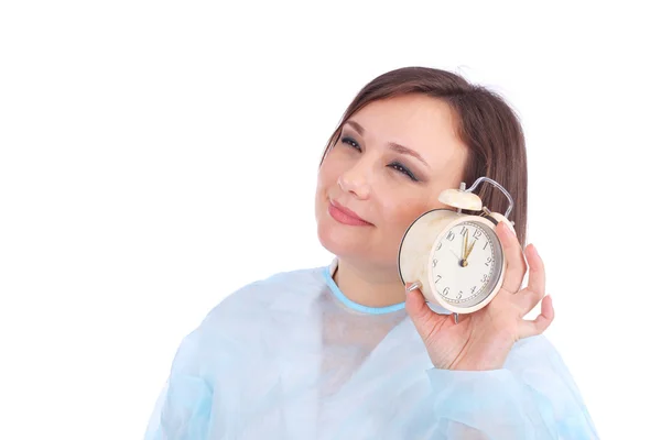 Femme endormie médecin avec horloge — Photo