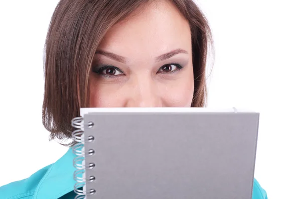 Pretty woman with grey writing book — Stock Photo, Image