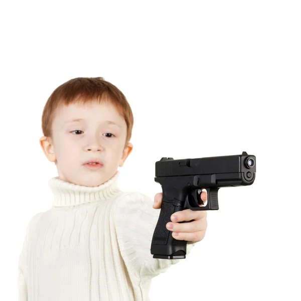 Little boy with black pistol — Stock Photo, Image