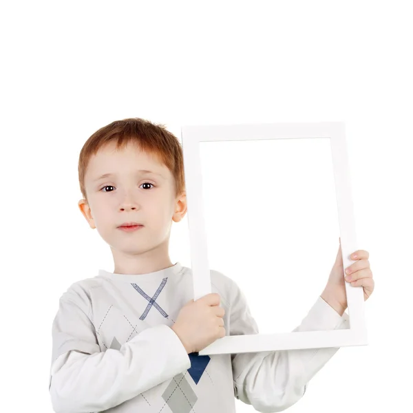 Menino com moldura de foto — Fotografia de Stock