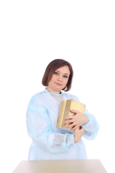 Jeune femme médecin avec des livres — Photo