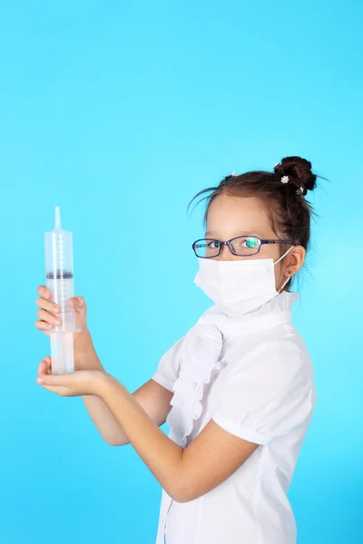 Little girl playing doctor — Stock Photo, Image