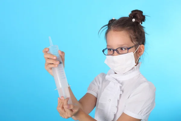 Little girl playing doctor — Stock Photo, Image