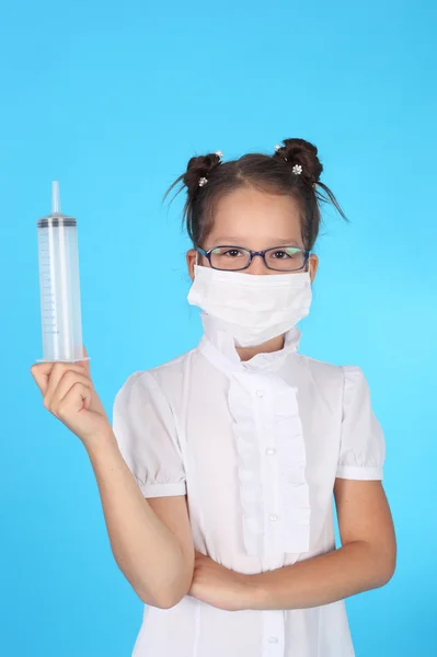 Little girl playing doctor — Stock Photo, Image