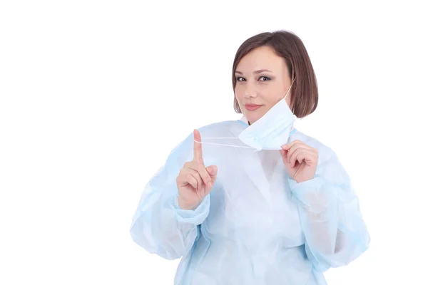 Jonge dokter bedrijf beschermend masker — Stockfoto