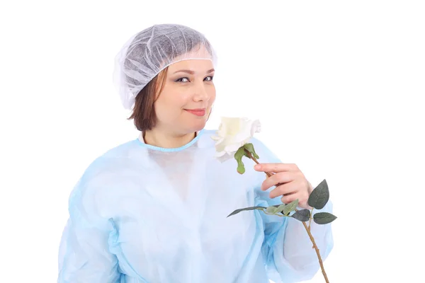 Αρκετά νέος γιατρός με λουλούδι — Φωτογραφία Αρχείου