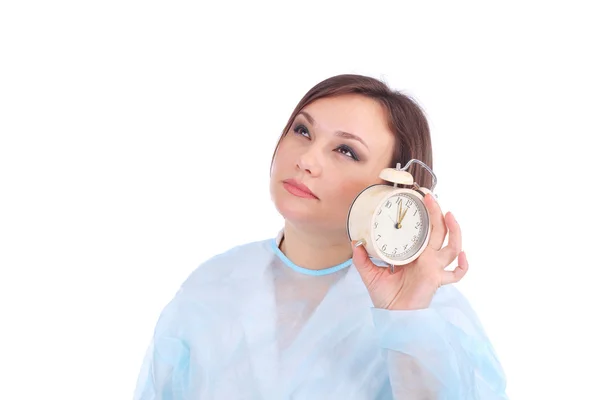 Mujer somnolienta bastante joven con reloj —  Fotos de Stock