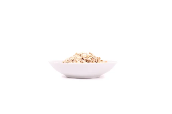 White plate of oats — Stock Photo, Image