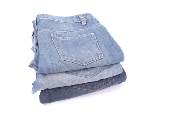 Several jeans isolated — Stock Photo, Image