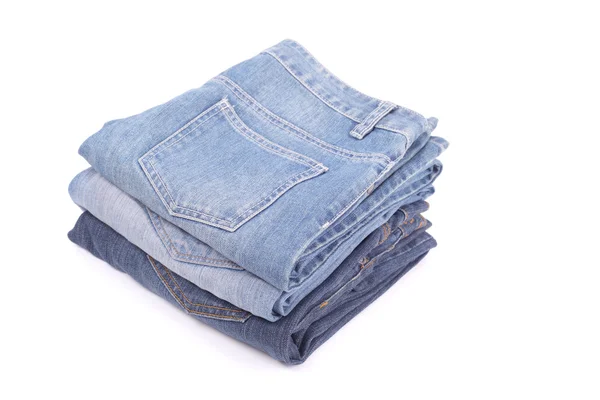 Flera jeans isolerade — Stockfoto