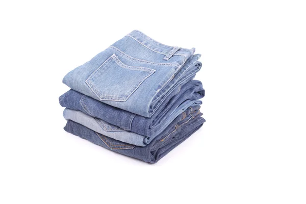 Several jeans isolated — Stock Photo, Image