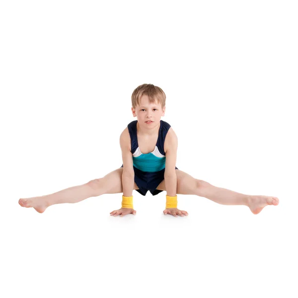 Chico gimnasta haciendo ejercicios — Foto de Stock