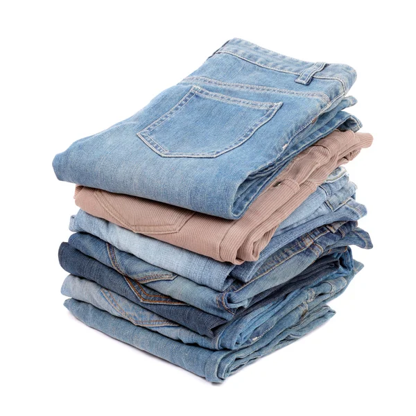 Flera jeans isolerade — Stockfoto