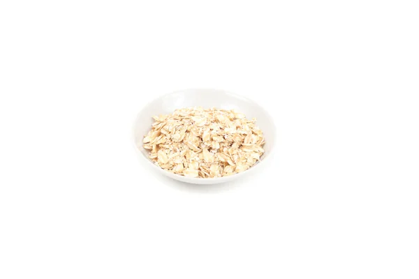 Oats in a plate — Stock Photo, Image