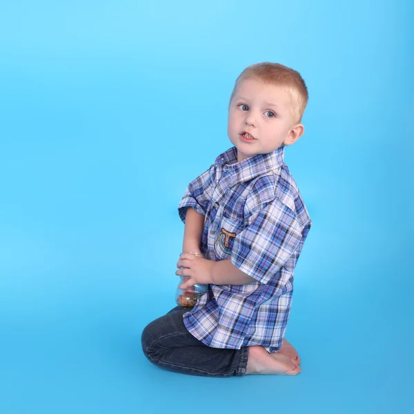 Jongen met de snoepjes — Stockfoto