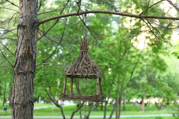 Bird feeder in a park — Stock Photo, Image