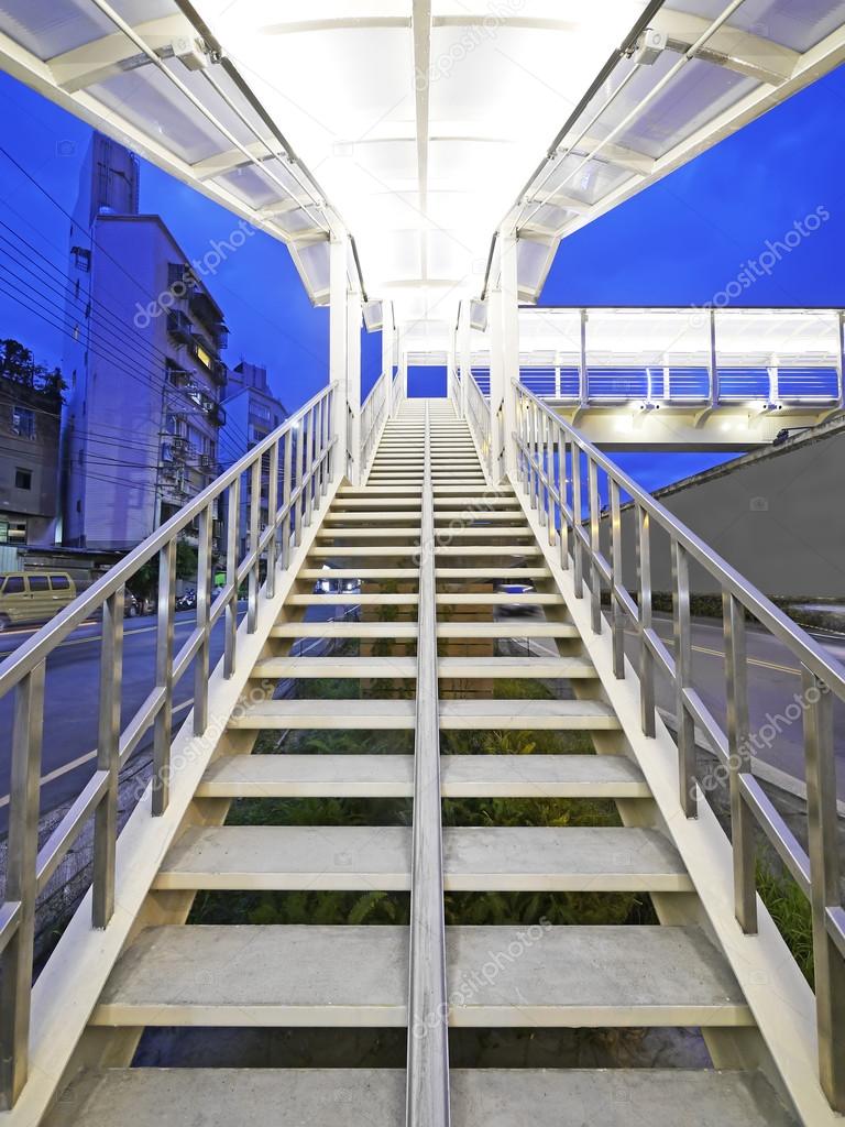 Long stair to footbridge