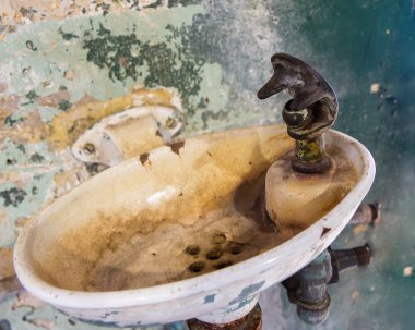 sink that is full of rust and other disgusting things. clipart