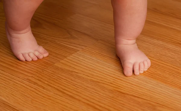 Young Girl Walking Hard Wood Floor Her First Time Stock Photo