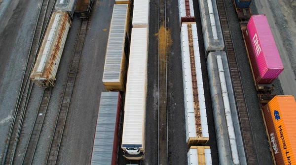 Train tracks with lots of trains lined up — Stock Photo, Image