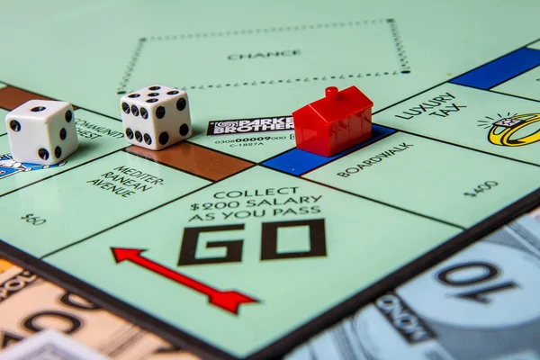 Good family game of monopoly — Stock Photo, Image